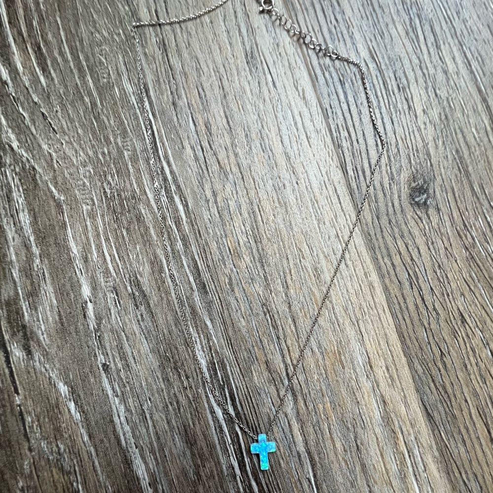 NWOT LF hologram iridescent cross necklace